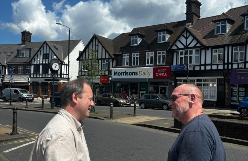 Peter talking to resident